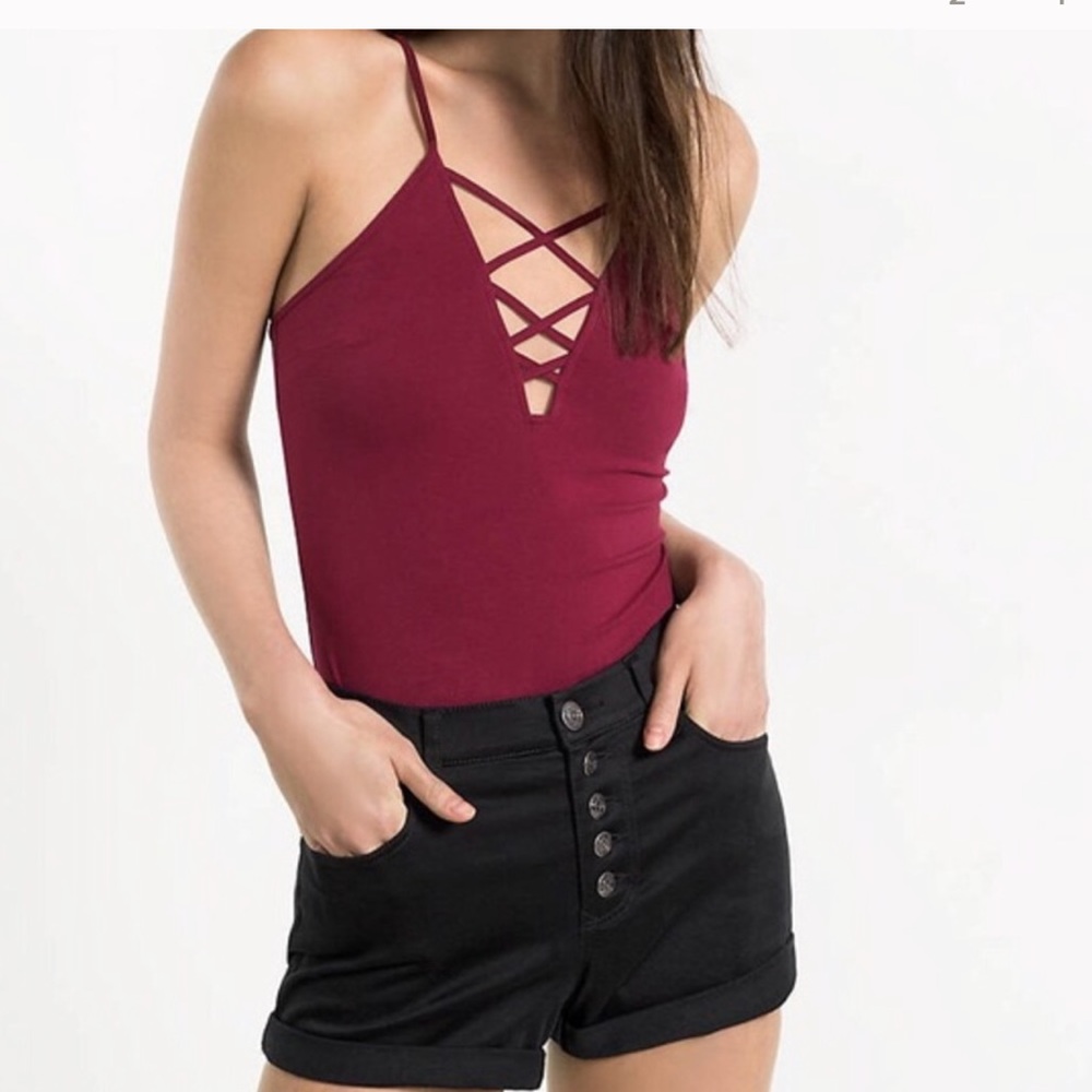 RED CRISS CROSS GOING OUT TOP